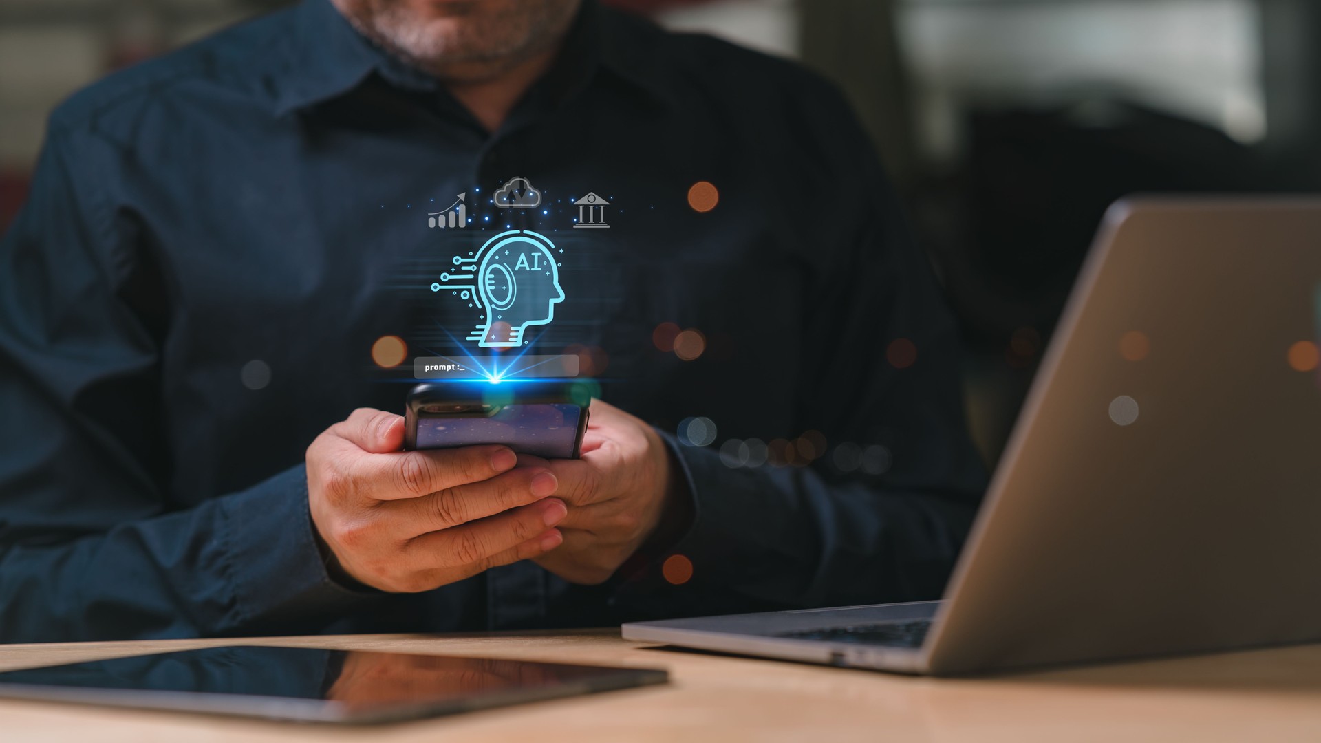 Concept Smart home devices that use AI technology. A man is holding a phone up to their face to ask Ai and use laptop. Technology and artificial intelligence, and futuristic and advanced.